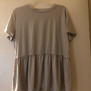 Short sleeve ruffled bottom top